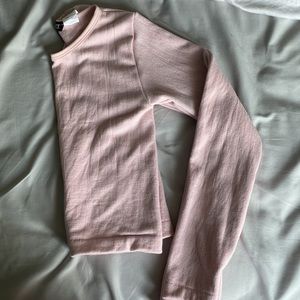 Urban planet thick long sleeve baby tee. The color is a very  nice baby pink.